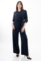 modella indossando Pantalone palazzo con elastico in vita in tela fluida misto viscosa colore