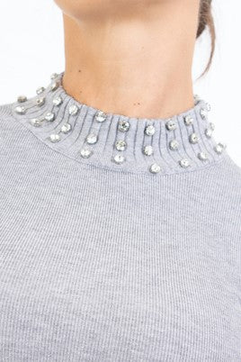 Maglia Shine con strass su collo e polsi