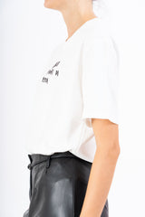 T-shirt in cotone con ricamo “mi mandi fuori di testa”