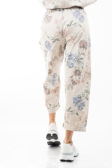 Pantalone floreale in cotone elasticizzato con pince e vita elasticizzata