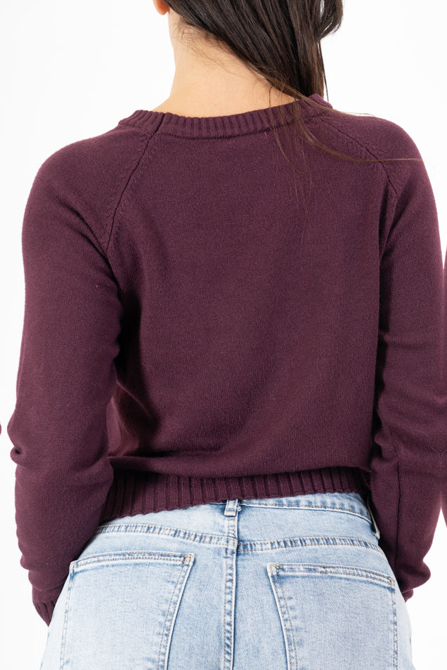 modella indossando Maglione sportivo con maniche raglan e bordo a coste colore