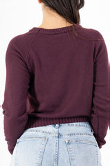 modella indossando Maglione sportivo con maniche raglan e bordo a coste colore