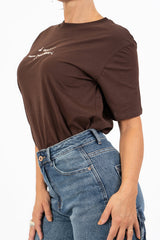 T-shirt in cotone con ricamo “di mattina non parlatemi”