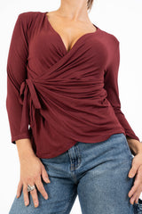 Maglia drappeggiata in viscosa con nodo laterale