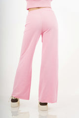 modella indossando Pantalone palazzo in felpa elasticizzata con coulisse colore