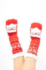 modella indossando Home Socks Natalizie – Babbo Natale Happy colore Rosso Unica