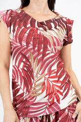 Blusa fantasia foglie in viscosa con manica corta e linea morbida.