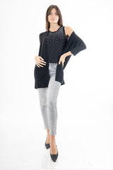 modella indossando Jeans slim fit grigio chiaro lavaggio used in denim cotone e lyocell colore