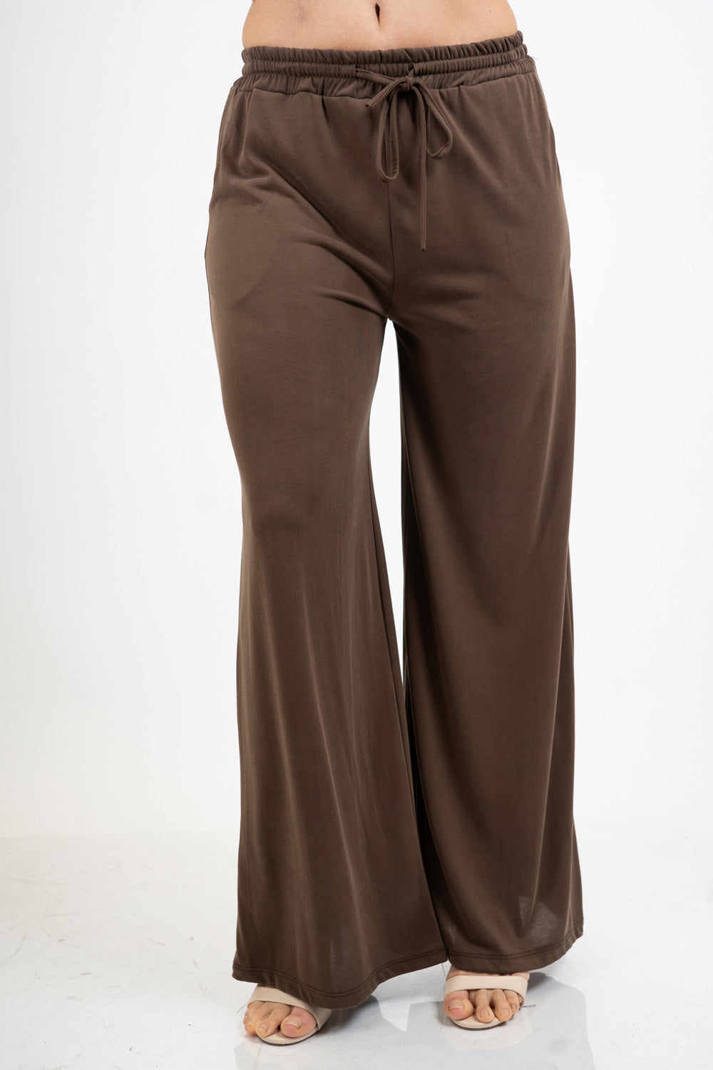 Pantalone palazzo in viscosa elasticizzata con coulisse Made in Italy.