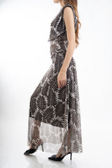 modella indossando Completo top a palloncino e gonna lunga in microrete Feather Leaf colore