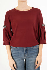 Maglia Balloon Chic con spilla gioiello