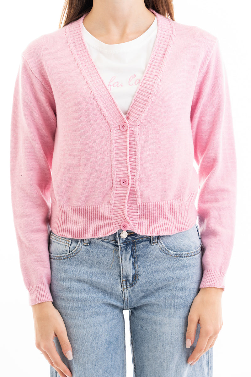 modella indossando Giacchino corto in filato primaverile con scollo a V e bottoni colore Rosa Unica