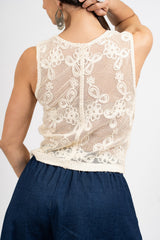 Gilet rete ricamata a fiori.
