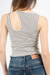 Top donna a costine elastiche con apertura asimmetrica sulla spalla.