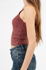 Top scollo V in maglia lurex a costine.