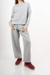 modella indossando Pantalone palazzo felpa con elastico colore Grigio Unica