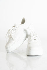 modella indossando Sneakers platform bianche con suola alta colore Bianco 41