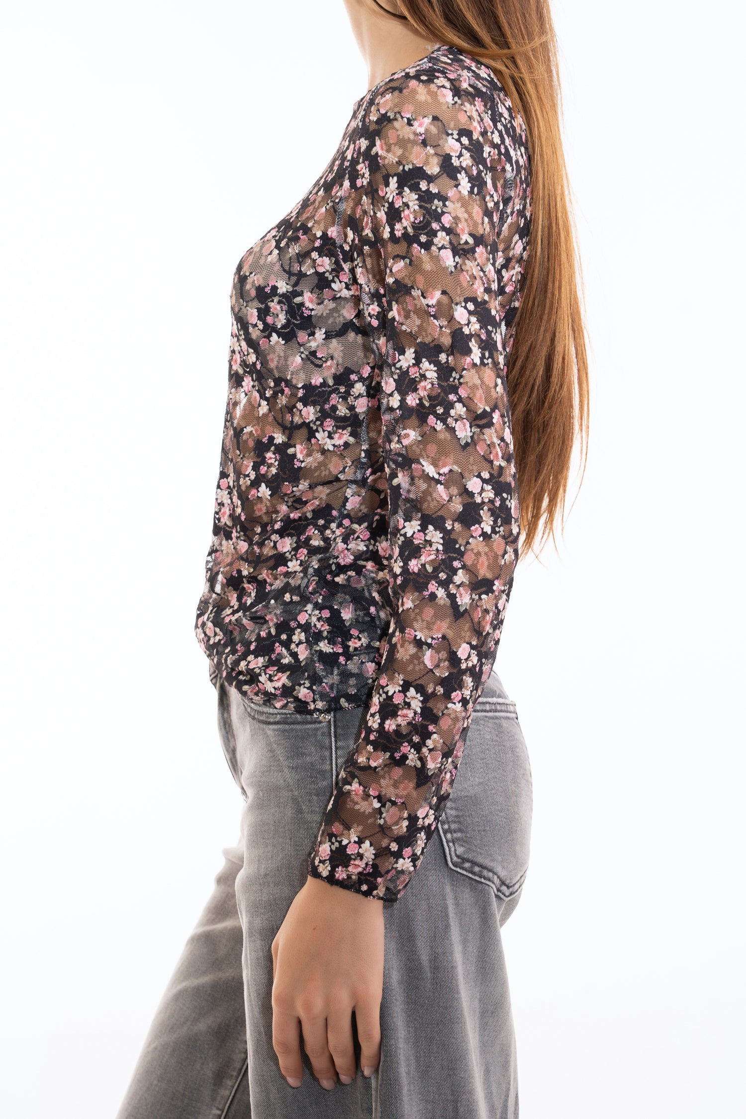 modella indossando Maglia in pizzo elasticizzato trasparente a fiori manica lunga colore