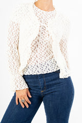 Cardigan goffrato con fiocco e maniche svasate