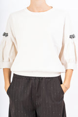 Maglia Balloon Chic con spilla gioiello