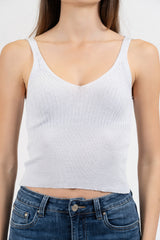 Top scollo V in maglia lurex a costine.