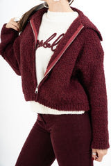 Giacca corta in filato bouclé con colletto e zip metallica