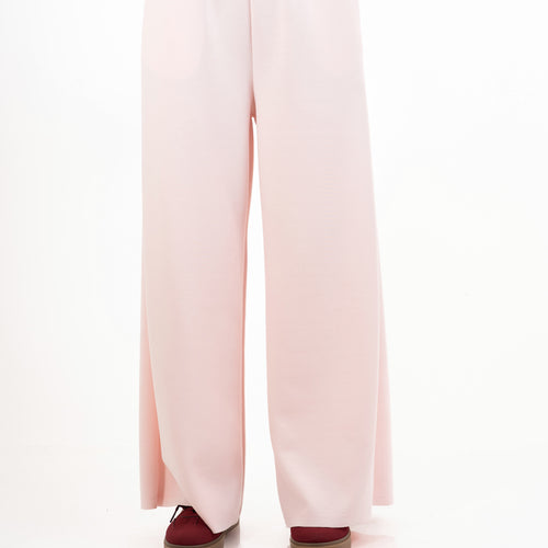 modella indossando Pantalone palazzo felpa con elastico colore