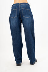 Jeans con pences laterali