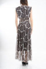 modella indossando Completo top a palloncino e gonna lunga in microrete Feather Leaf colore