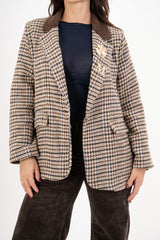Giacca fantasia pied-de-poule con spille dorate