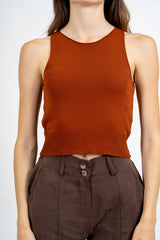 Top smanicato in maglia di viscosa con fondo a costina