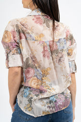Camicia donna in tencel leggero con manica risvoltata e laccetto.