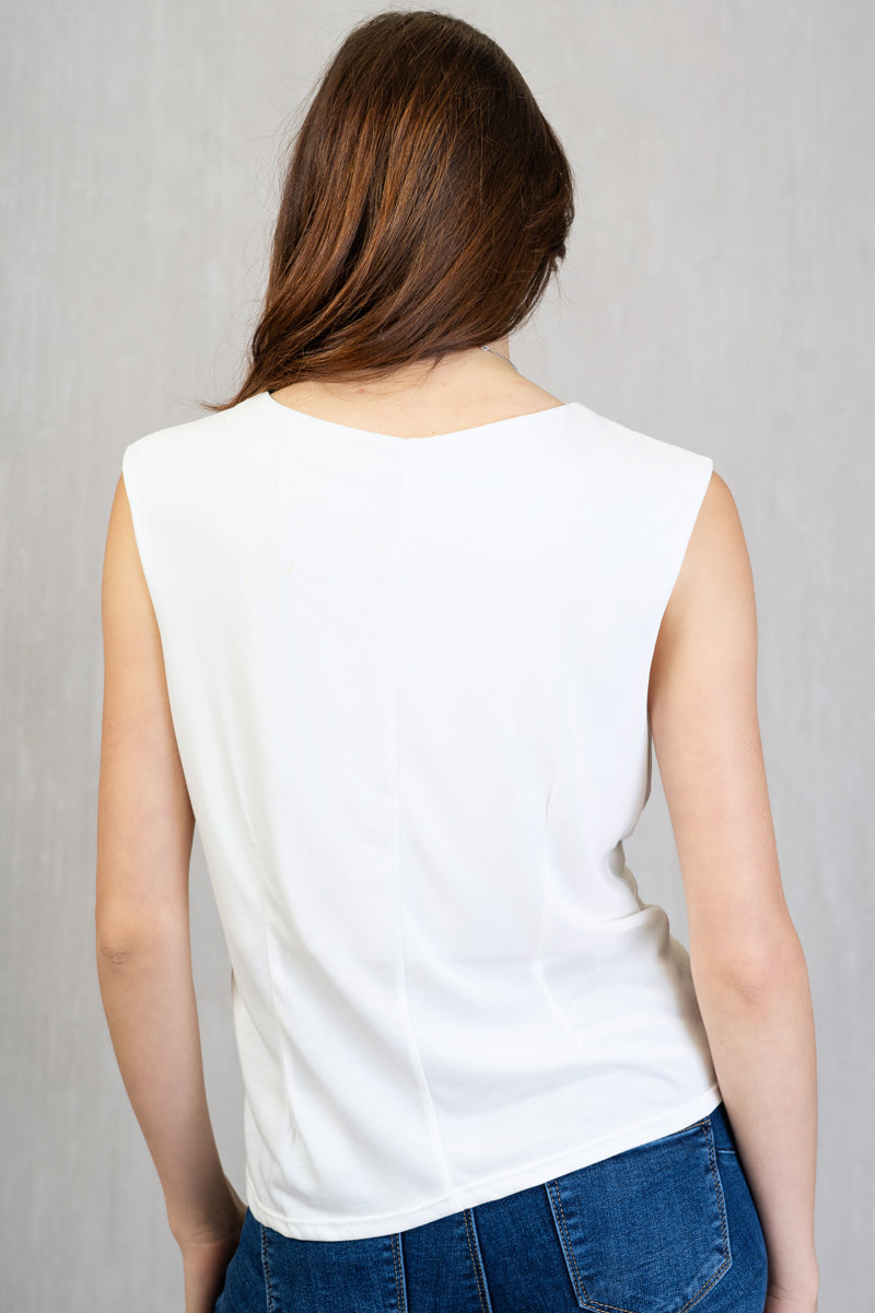 Maglia smanicata con drappeggio seno