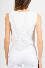 Gilet corto ricamato con paillettes.