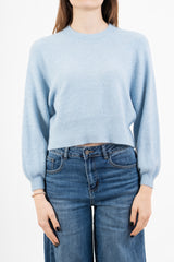 modella indossando Maglione morbido con manica ampia e bordo a costine colore Celeste Unica