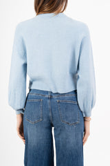 modella indossando Maglione morbido con manica ampia e bordo a costine colore