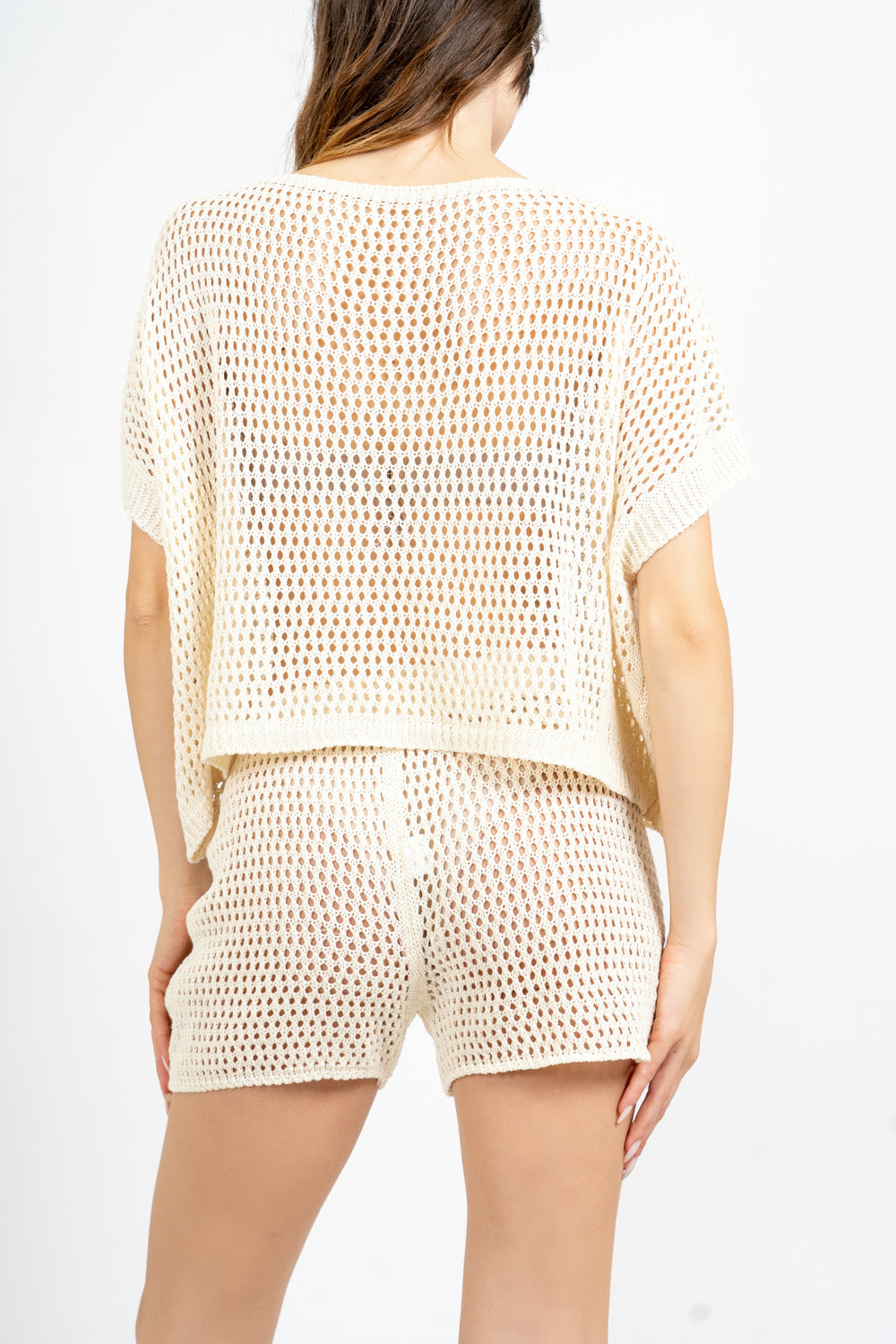 Completo rete crochet con shorts.