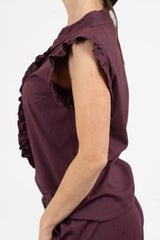 Camicia smanicata con rouge in cotone elasticizzato.
