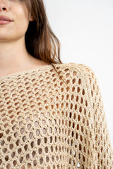 Poncho rete lurex in cotone effetto crochet.