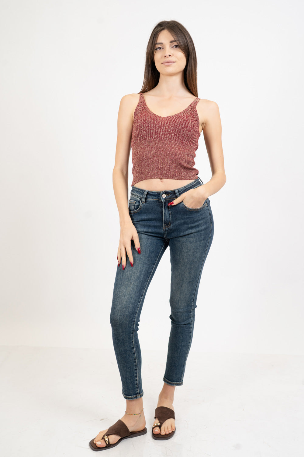 Top scollo V in maglia lurex a costine.