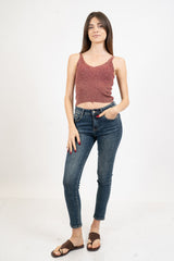 Top scollo V in maglia lurex a costine.