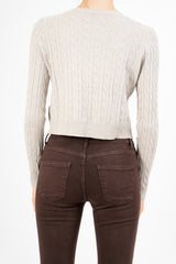 Cardigan corto in lurex con disegno a treccia