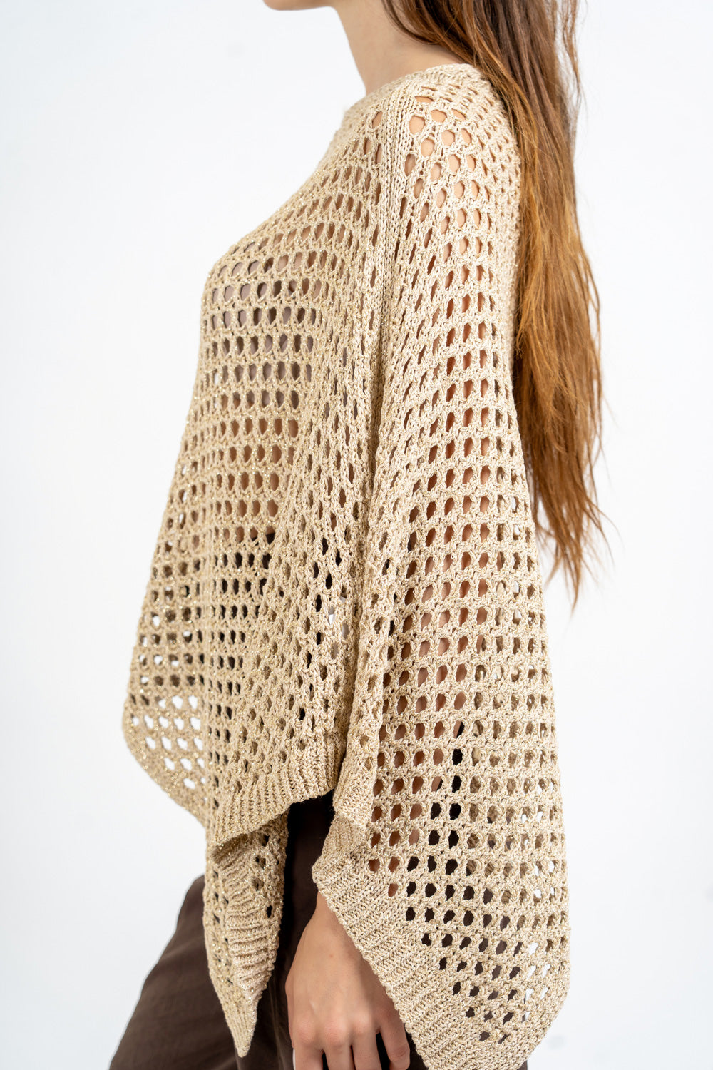 Poncho rete lurex in cotone effetto crochet.