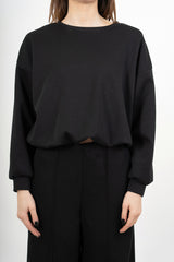 modella indossando Maglia felpa over con spalla scesa ed effetto palloncino colore