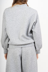 modella indossando Giacca in felpa misto viscosa con zip e manica ampia colore