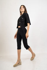 Pantalone Capri elasticizzato con spacchetto.