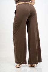 Pantalone palazzo in viscosa elasticizzata con coulisse Made in Italy.