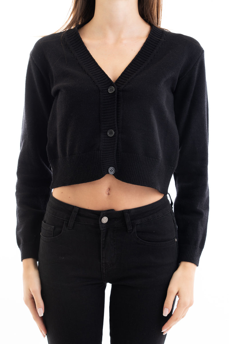 modella indossando Giacchino corto in filato primaverile con scollo a V e bottoni colore Nero Unica