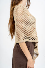 Poncho rete lurex in cotone effetto crochet.