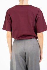 T-shirt in cotone con ricamo “mi mandi fuori di testa”